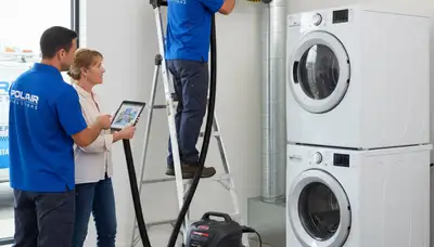 Technician performing professional dryer vent cleaning in Fort Worth TX home for Five Star Cooling